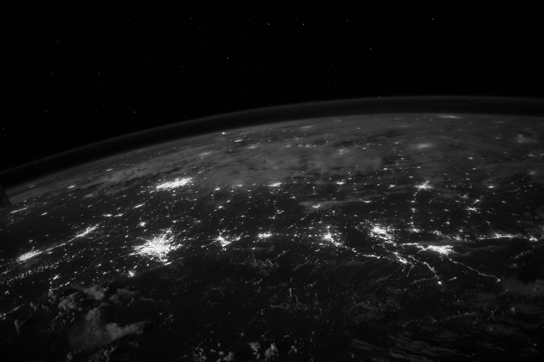 Black and white view of the Earth from space.